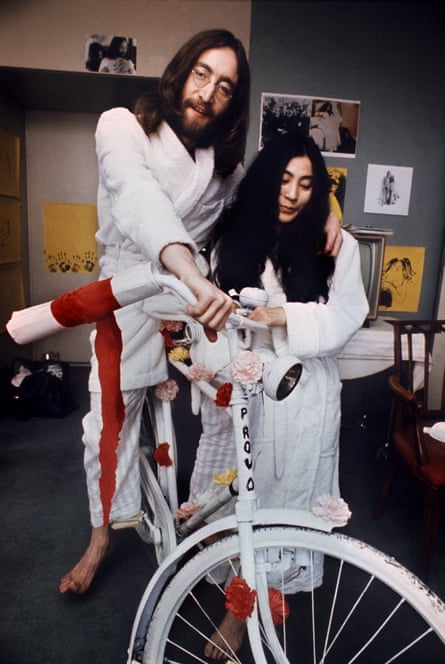 John Lennon and Yoko Ono (L) with a “Provo” bike in Amsterdam in 1969.
