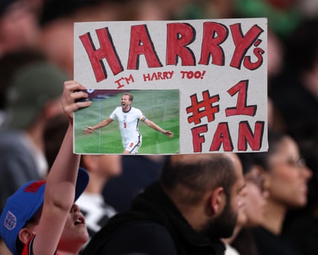 An England fan holds up a sign saying âÂÂHarry's #1 fanâÂÂ