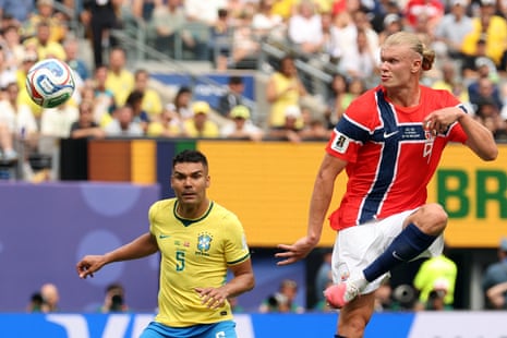 Norway's Erling Braut Haaland tries to lob the keeper.