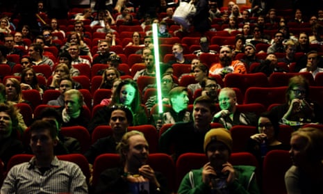 ‘Jar Jar Binks is BB-8’s dad!’ … Star Wars fans wait to see The Force Awakens at a screening in Finland.