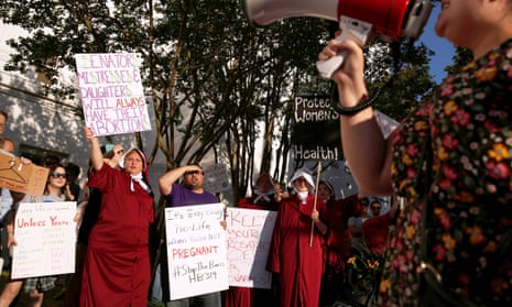 Pro-choice supporters protest as Alabama state senate votes on the strictest anti-abortion bill in the United States.