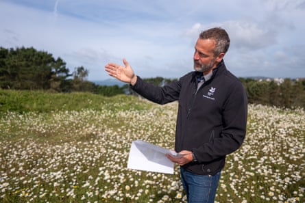 Rich Snow standing in a field