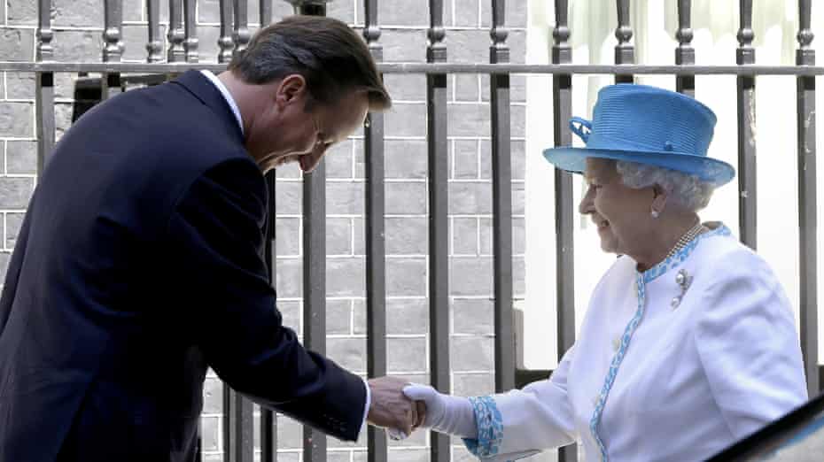 David Cameron welcomes Queen Elizabeth II to Downing Street.