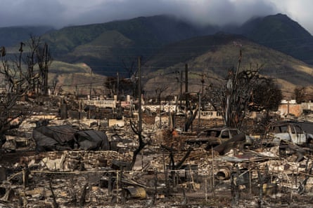 Damaged property lies scattered in the aftermath of a wildfire in Lahaina, Hawaii, in August 2023.