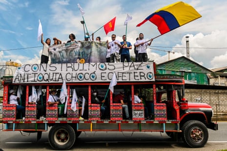 Former Farc guerrilla fighters ride in ‘chivas’ – local transport vehicles – towards Bogotá in Medellín, Colombia, in October 2020, demanding peace accords to be respected.