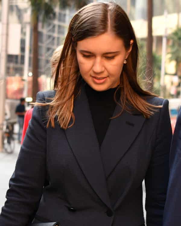 Former political staffer Brittany Higgins walks down a Sydney street