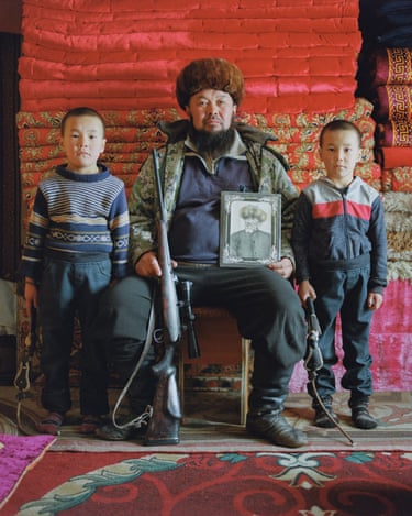 Nadir (47) and his two sons, Amir and Emir, with a portrait of Nadir’s Grandfather. Ottuk, February, 2021 Nadir, my best friend in Ottuk, recently told me that his eldest son would be joining the border guards. He was eighteen and would soon be married too. I imagined how his life would unfold from then on. Would he be stationed perhaps in a high traffic town on the Kazakh or Uzbek border? His wife pregnant, he’ll settle into a seated bureaucratic position in a stuffy government building with only the scars on his hands to remind him of the calluses he once had from farm work and wolf hunting.