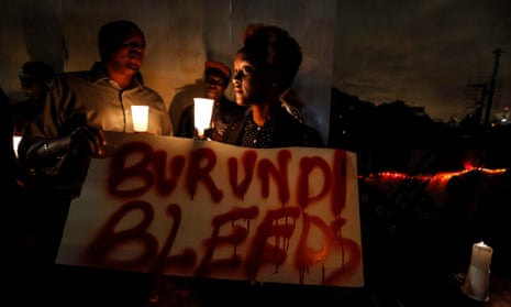 In Nairobi, Kenya, activists hold a candlelight vigil to call for peace in Burundi