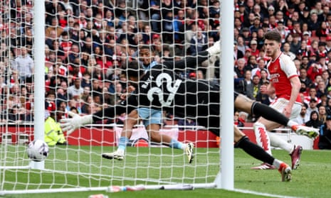 Aston Villa’s Leon Bailey scores their first goal past Arsenal’s David Raya.