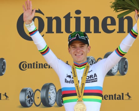 Remco Evenepoel enjoys the view from the podium after his stage 16 Tour win.