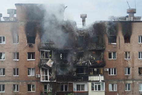 A view after a Russian attack that hit a residential building in Kharkiv, Ukraine, on Saturday.