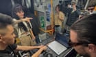 ‘Like a moving stage’: Brisbane commuters surprised by impromptu ‘train rave’