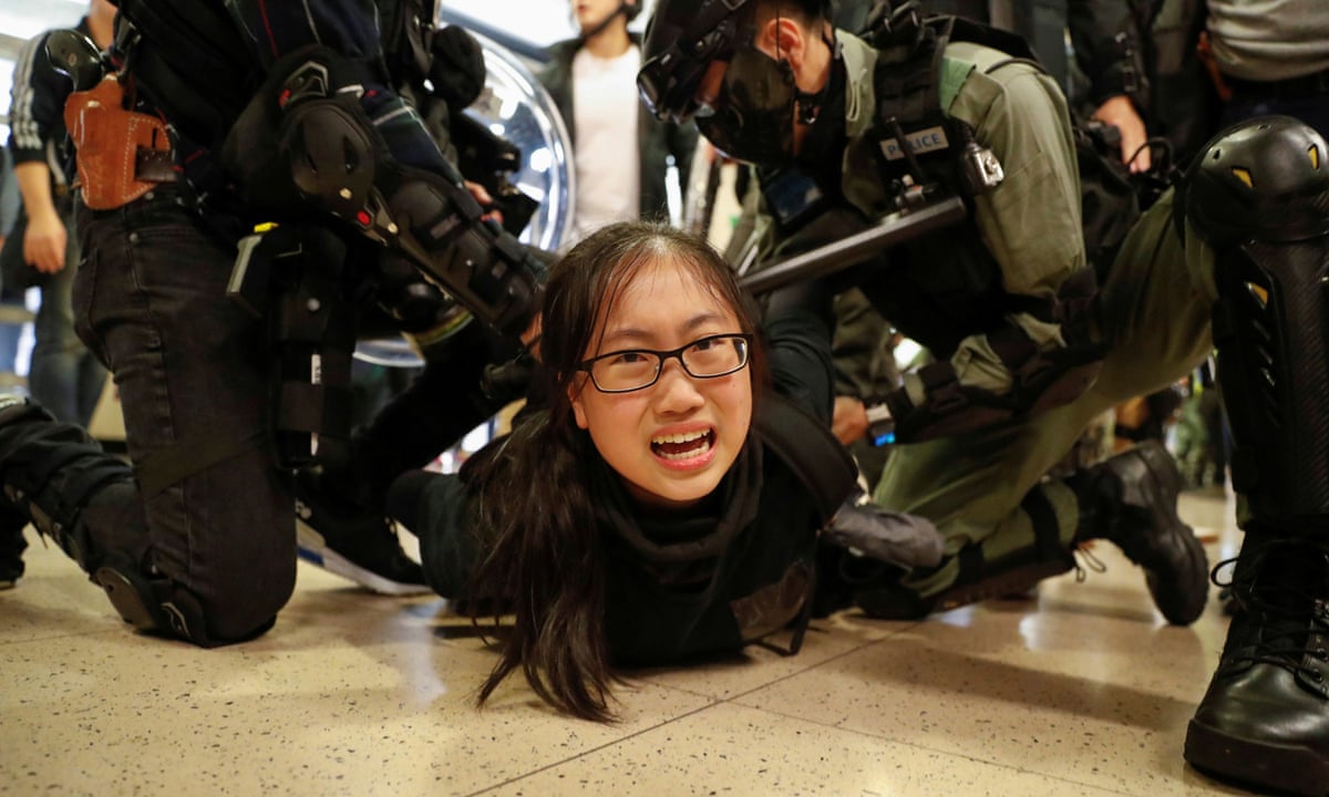Hong Kong violence breaks out again in shopping centres | Hong Kong | The Guardian
