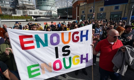 People take part during an Enough is Enough rally in Birmingham to protest against the cost of living crisis in October 2021.