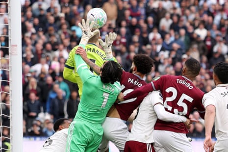 Pablo of West Ham United fouls David Raya of Arsenal before Callum Wilson (not pictured) scores a goal that is later disallowed