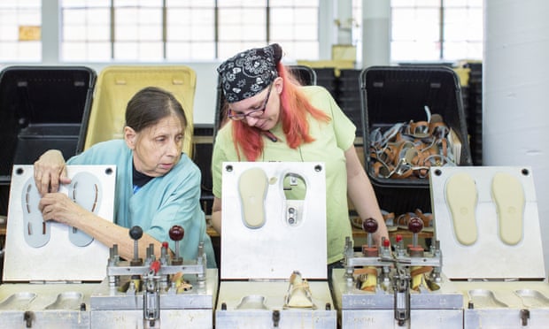 Sandal-makers Cheryl Mueller (on left) and Joanne Copeland at the Salt-Water shoe factory in St Louis, Missouri