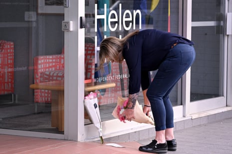 Members of the public have placed flowers outside the office of Helen Haines.