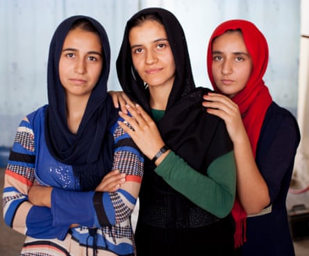 Raghda Ali (centre) with her younger sisters Mona and Mariam in Mosul, Iraq
