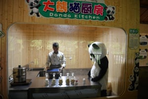 Keepers prepare food for giant pandas at the Yunnan Wildlife Park, China. The park has opened a panda kitchen where visitors can see how keepers prepare food for the animals