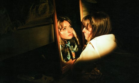 Sophie May and her reflection in a mirror