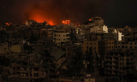 Flames and smoke rise in Tel al-Hawa neighborhood as Israeli attacks continue on the 24th day in Gaza City, Gaza on 30 October 2023.