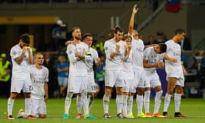 The Real Madrid players celebrate during the penalty shootout.