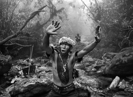 A Yanomami shaman performing a ritual the state of Amazonas, Brazil, in 2014.