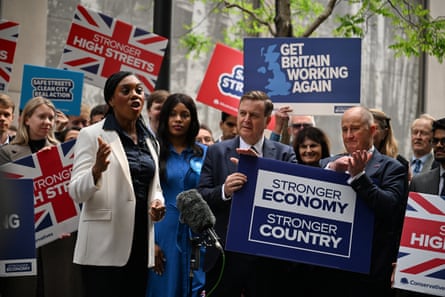 Kemi Badenoch speaking to the press outside Westminster city hall on Friday.