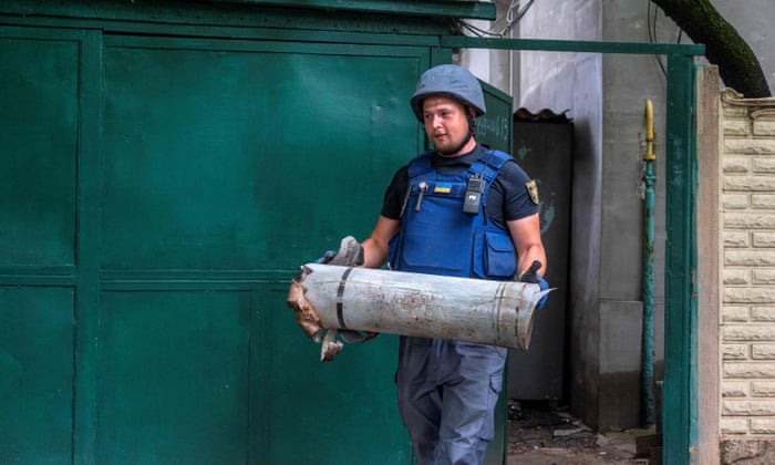 A Ukrainian bomb disposal expert during a mine clearance operation in the northern outskirt of Kharkiv.