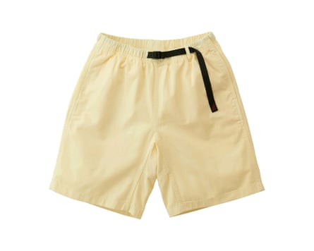 Lemon yellow shorts with a black belt