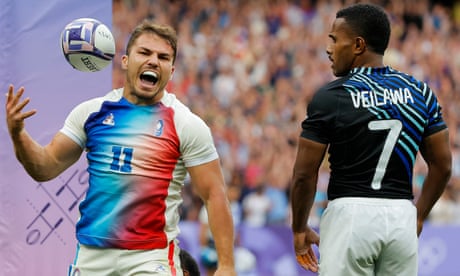 France’s Antoine Dupont celebrates after scoring at the Stade de France.
