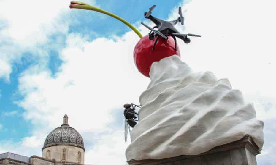 THE END, a sculpture of a giant swirl of whipped cream, a cherry, a fly and a drone that transmits a live feed.