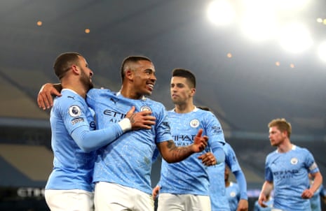 Gabriel Jesus of Manchester City celebrates with team mate Kyle Walker (left) after scoring their side’s second goal.