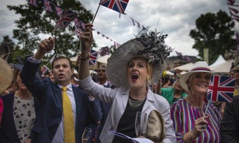 Racegoers sing around the bandstand at the end of the first day at Royal Ascot.