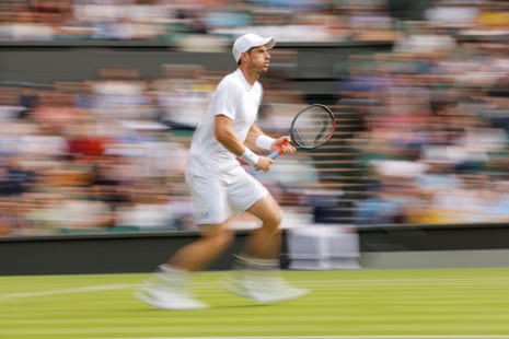 Andy Murray positions himself to receive a shot from James Duckworth.