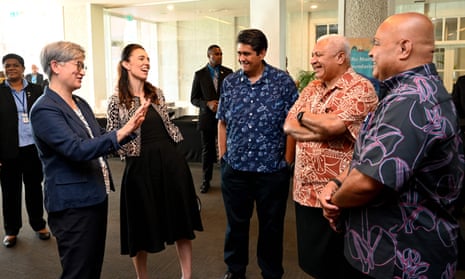 (L-R) Australia’s foreign minister Penny Wong (L), New Zealand prime minister Jacinda Ardern, Palau president Surangel Whipps Jr, Fiji prime minister Frank Bainimarama and David Panuelo, president of Federated States of Micronesia, chat as leaders from the Pacific Islands gather for the opening remarks at Pacific Islands Forum in Suva on Tuesday.