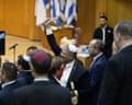Itamar Ben-Gvir, centre, celebrates at the Knesset on 30 March 2026