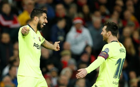 Suárez celebrates with Messi during the first leg of Barcelona’s Champions League quarter-final win over Manchester United.