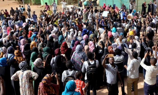 Sudanese demonstrators chant slogans as they participate in anti-government protests in Khartoum.