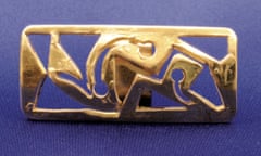 A gold rectangular ring