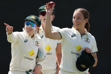 Darcie Brown holds up the ball after her five-fer.