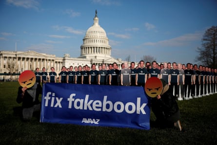 Protesters outside the US Capitol in Washington as Mark Zuckerberg testifies about Facebook’s privacy policies.