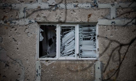 A broken window of a damaged residential building following a shelling in the town of Bakhmut, Donetsk region.