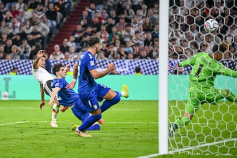 Tom Bischof (left) smacks the ball home to give Germany the lead.