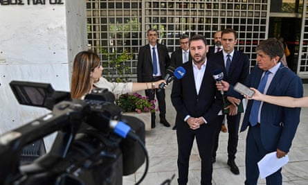 Nikos Androulakis talks to media after filing a complaint at the supreme court in Athens.