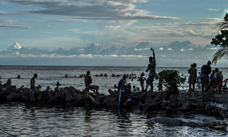 Stranded migrants from Haiti wait for a boat to take them to Capurganá, near the Panama border, in Necoclí, Colombia. 