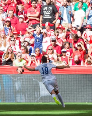 Jodie Taylor of England celebrates after scoring a goal against Canada.