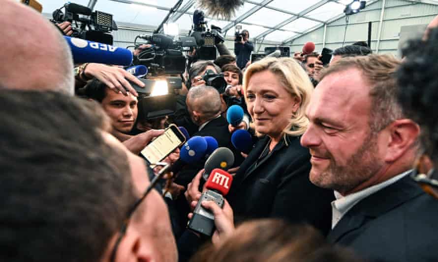 Marine Le Pen speaks to journalists in Henin-Beaumont, northern France