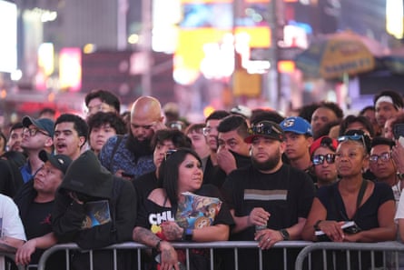 Fans gathered in Times Square outside the fenced-in arena hoping to catch a glimpse of the action.
