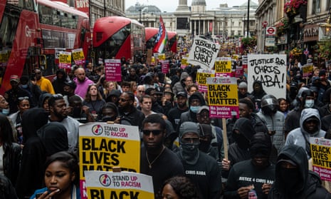 Demonstrators march down Whitehall to Scotland Yard to protest the killing of Chris Kaba on September 10.